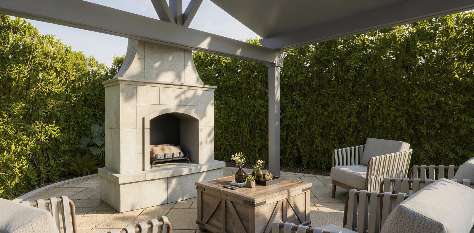 3D design rendering of a cast-stone outdoor fireplace beside a covered pavilion for a Chula Vista backyard