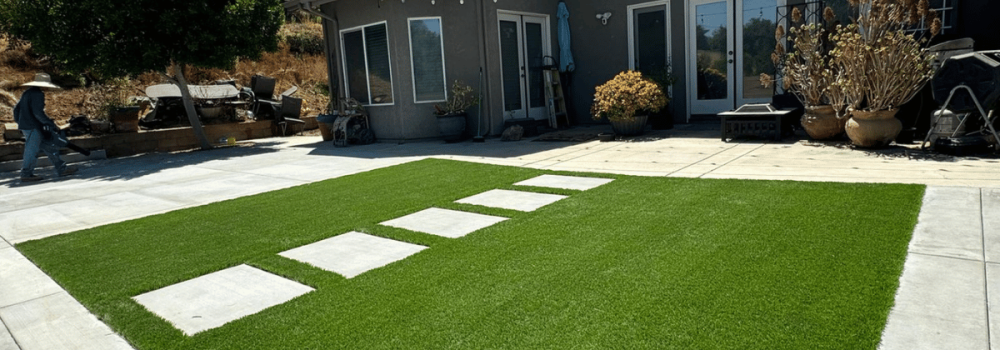 Mix Of Artificial Turf & Concrete Blocks
